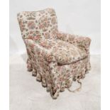 Late Victorian armchair in cream ground loose covers, on square section tapering front legs to brown