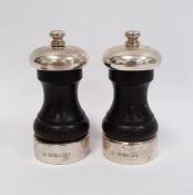 Pair of early 21st century silver-mounted and wooden turned salt and pepper mills, makers M C Hersey