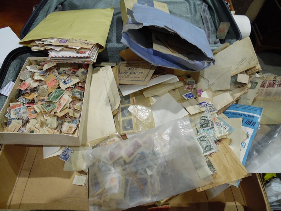 Suitcase of assorted loose stamps