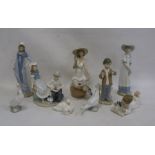 Quantity of Nao figures to include boy bandaging girl's foot, Edwardian-style lady, girl seated on
