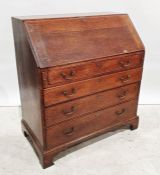 Late 19th century oak bureau with fitted interior, four graduated drawers, on bracket feet, 99cm