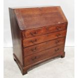 Late 19th century oak bureau with fitted interior, four graduated drawers, on bracket feet, 99cm