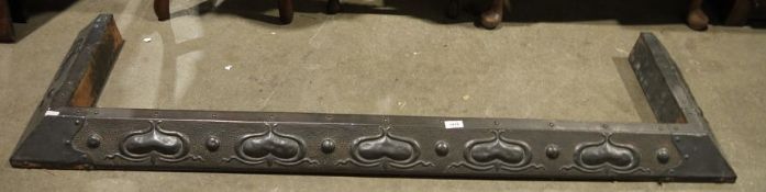 Art Nouveau copper fire curb with embossed decoration, 120cm wide approx.