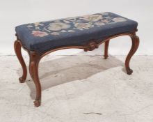 Needlework topped stool with carved walnut frame, on cabriole legs, 83cm x 45cm