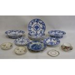 Two old Delft plates, blue and white decorated with floral and fence-pattern to the centre, stylised