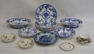 Two old Delft plates, blue and white decorated with floral and fence-pattern to the centre, stylised