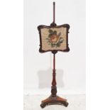 19th century rosewood needlework polescreen with floral spray, on baluster turned and carved
