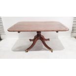 Mahogany and banded snap-top table, of rectangular form with rounded corners, on single pedestal