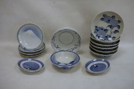 Various modern Oriental blue and white plates and bowls, floral decorated, mountain decorated, fan