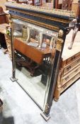 Gilt and ebonised overmantel mirror, the top with egg and dart and other mouldings above the bevel