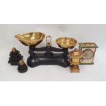 Set of vintage kitchen scales, set of weights, modern mantle clock and gilt metal lidded urn