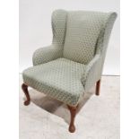 Early 20th century wingback chair on cabriole front legs