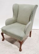 Early 20th century wingback chair on cabriole front legs