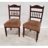 Set of four late 19th/early 20th century dining chairs with carved top rails and turned front