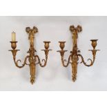 Pair of twin branch gilt metal sconces with ribbon and floral decoration (2)