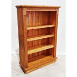 20th century pine open bookcase on plinth base, 91cm x 137cm