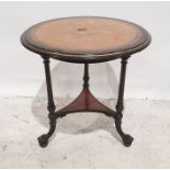 19th century continental ebonised centre table, the circular top with bird's eye maple veneer and