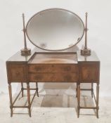 20th century dressing table with oval mirror superstructure above four assorted drawers, on turned