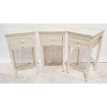 Set of three 20th century side tables with cream-painted tray tops, two drawers, on square section