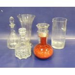 Two modern glass decanters, two large vases, a heavy hexagonal glass vase and a red mottled glass