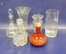 Two modern glass decanters, two large vases, a heavy hexagonal glass vase and a red mottled glass