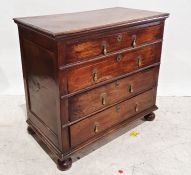 Antique oak and pine chest of four long graduated drawers with brass pear-shaped drop handles,