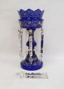 Victorian blue and white overlay glass lustre, having pointed scalloped edge, the top painted with