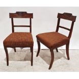 Pair 19th century mahogany chairs with carved top rails, sabre front legs (2)