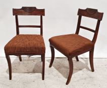 Pair 19th century mahogany chairs with carved top rails, sabre front legs (2)