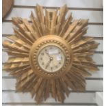 20th century Smiths sunburst clock, in gold coloured moulded frame, 45 cm approx