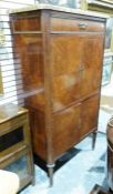 Continental empire-style cabinet, the marble top above single drawer and two pair of cupboard doors,