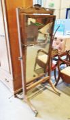 19th century mahogany cheval mirror, rectangular plate glass with two brass candleholders to the