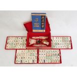 Mahjong set in card carrying case Condition Report Heavy wear to card carrying case. Some marking,