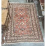 Red ground Eastern-style rug with stepped border 170cm x 127 cmCondition ReportExtra photos added