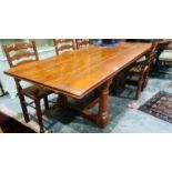 Modern rectangular table on turned and block supports, stretchered base, approx. 210cm
