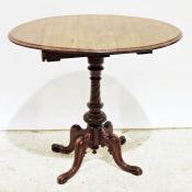 19th century mahogany drop-leaf table on turned and carved column to four ogee carved supports