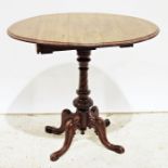 19th century mahogany drop-leaf table on turned and carved column to four ogee carved supports