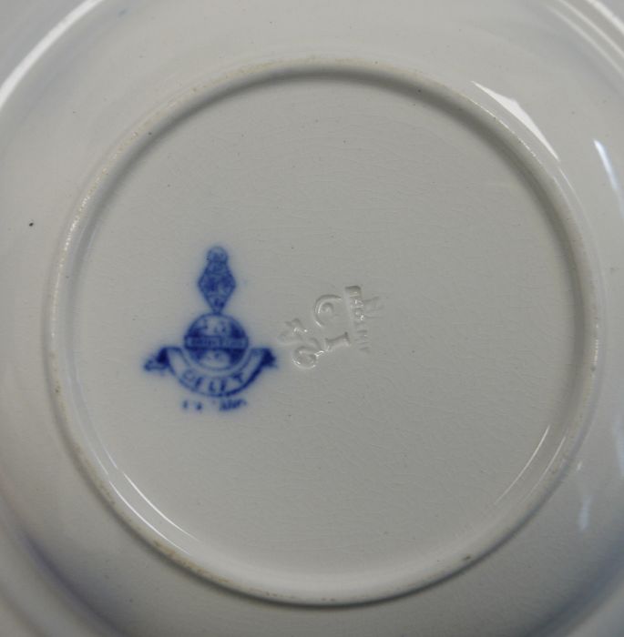 Two old Delft plates, blue and white decorated with floral and fence-pattern to the centre, stylised - Image 2 of 4