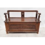 20th century oak monk's-type bench with carved decoration to the front, 118cm x 74cm