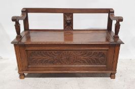 20th century oak monk's-type bench with carved decoration to the front, 118cm x 74cm