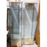 Pair of narrow four-sided glass display cabinets with glass shelves, beech-effect tops and bases (2)