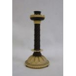 Carved ivory and hardwood candlestick with spirally twisted column and domed foot, initialled H G