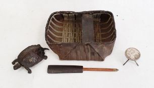 Miniature coracle, 15cm, with oar, small brass box in the form of a turtle and a miniature silver-