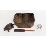 Miniature coracle, 15cm, with oar, small brass box in the form of a turtle and a miniature silver-