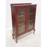 20th century mahogany two-door glazed cabinet, the rectangular top with moulded cornice above two