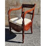 19th century mahogany commode chair with bar back, fluted arms, lift top seat, on turned supports