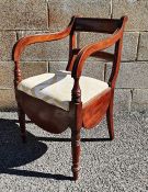 19th century mahogany commode chair with bar back, fluted arms, lift top seat, on turned supports