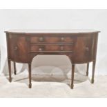 Reproduction Regency mahogany sideboard, the shaped top above two central doors flanked by two