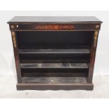 Victorian gilt and ebonised open bookcase, the rectangular top with moulded edge, the frieze with