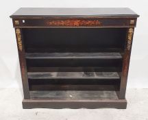 Victorian gilt and ebonised open bookcase, the rectangular top with moulded edge, the frieze with